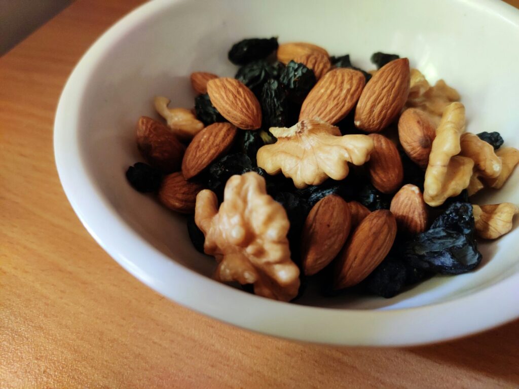 A bowl of mixed nuts used to CrossFit nutrition