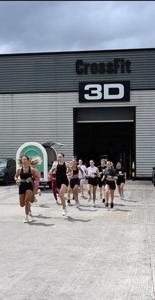 women running at a CrossFit gym enjoying women's fitness